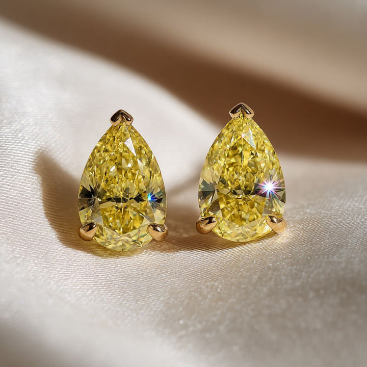 Yellow Pear Cut Moissanite Stud Earrings Gold