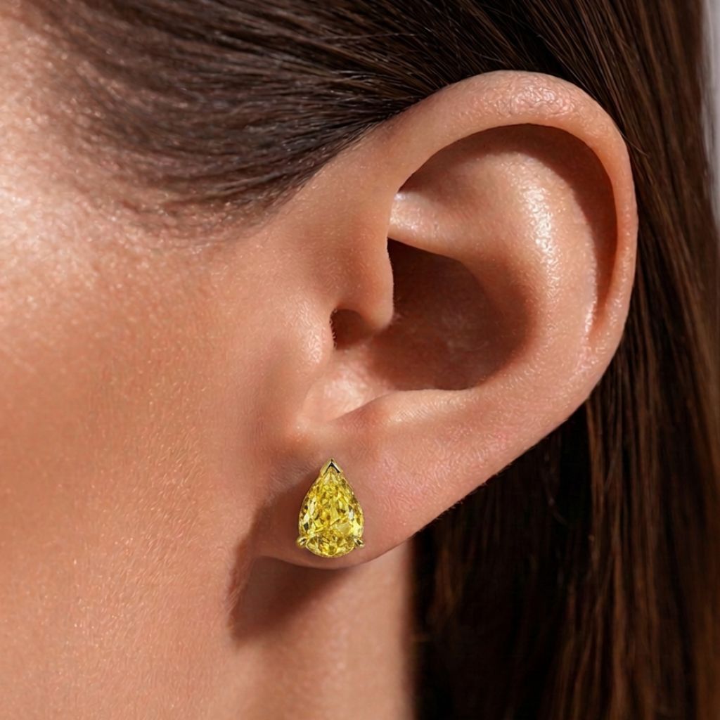 Yellow Pear Cut Moissanite Stud Earrings Silver