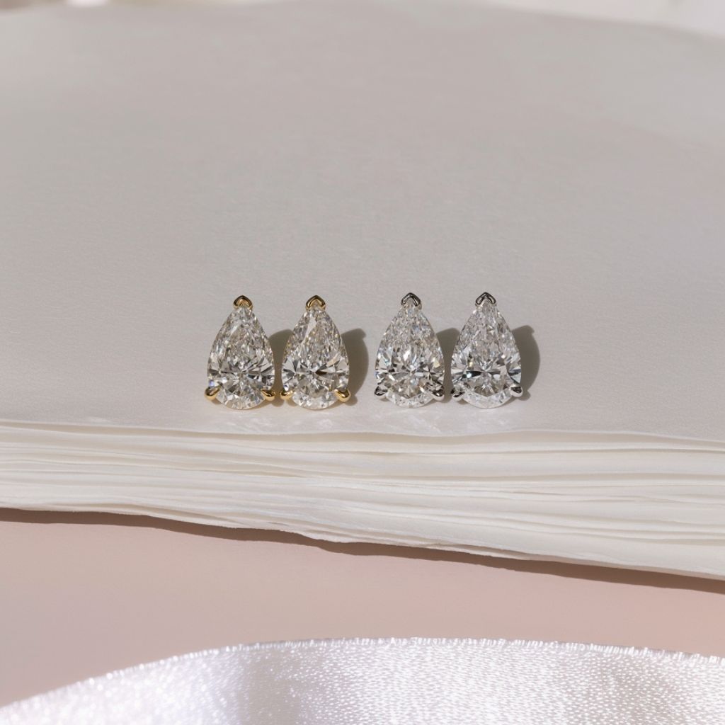 Alisee Pear Cut Moissanite Stud Earrings Silver