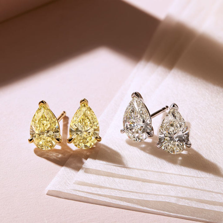 Yellow Pear Cut Moissanite Stud Earrings Silver